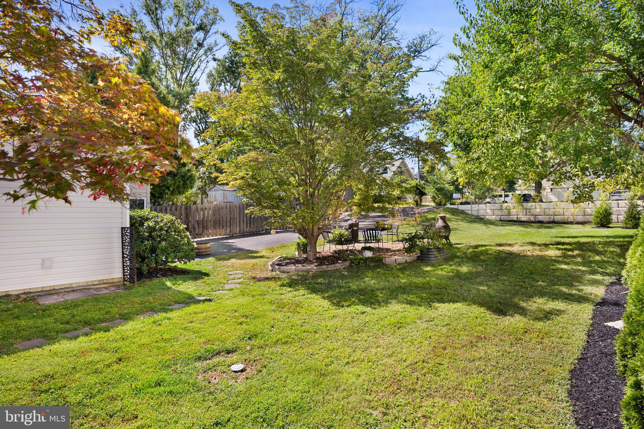 361 East Butler Avenue Ambler, PA 19002 - Photo 31 of 39 a backyard of a house with a yard and outdoor seating