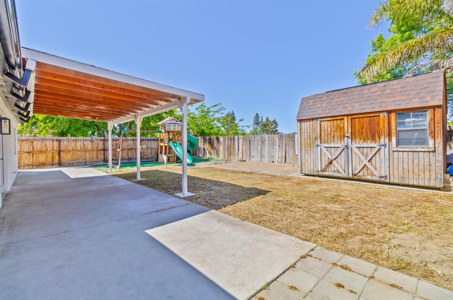 7110 Firebaugh Street Bakersfield, CA 93313 - Photo 33 of 37 a view of a backyard