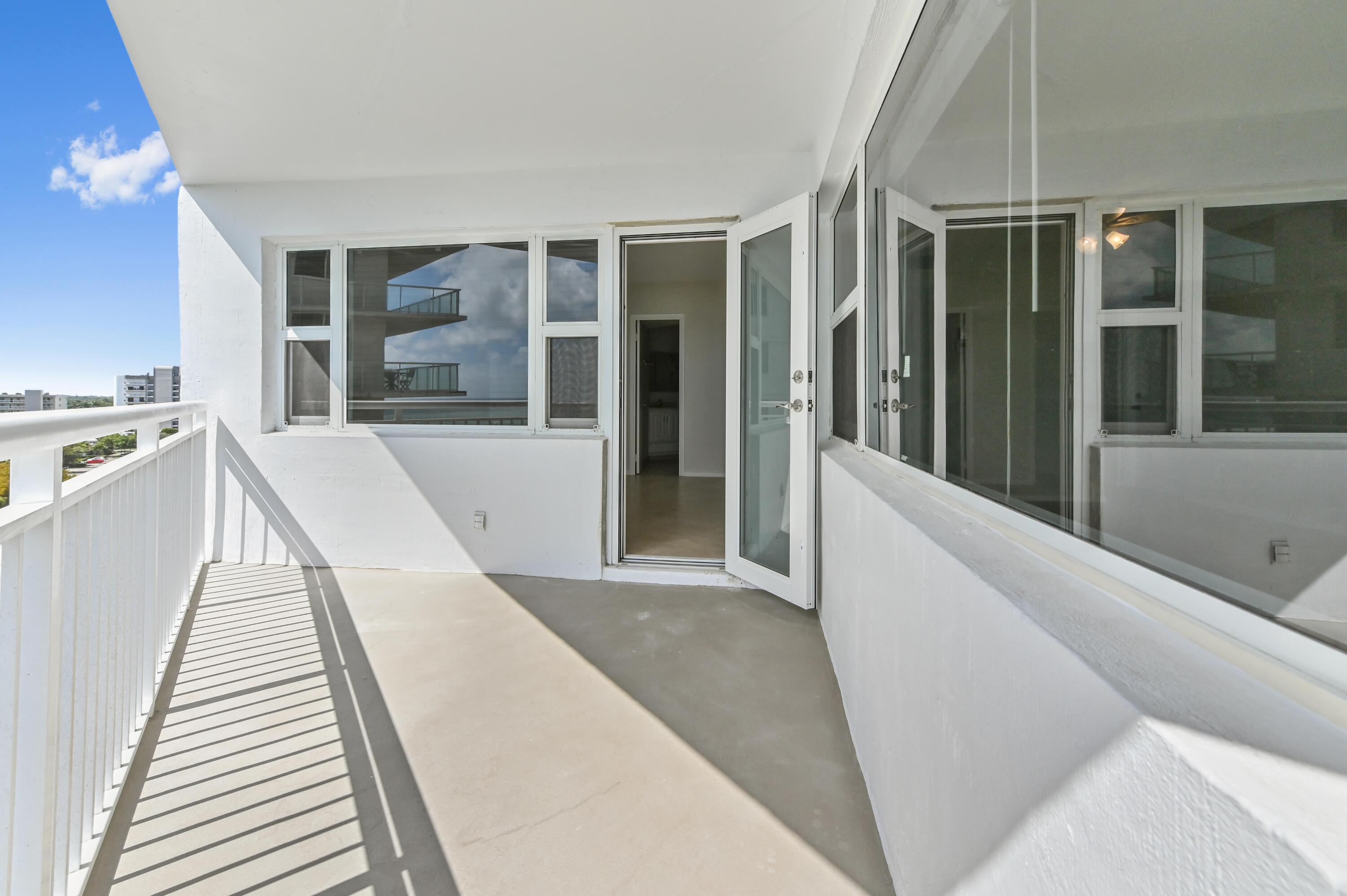 710 North Ocean Boulevard, Unit 710 Pompano Beach, FL 33062 - Photo 30 of 42 a view of a kitchen with staircase