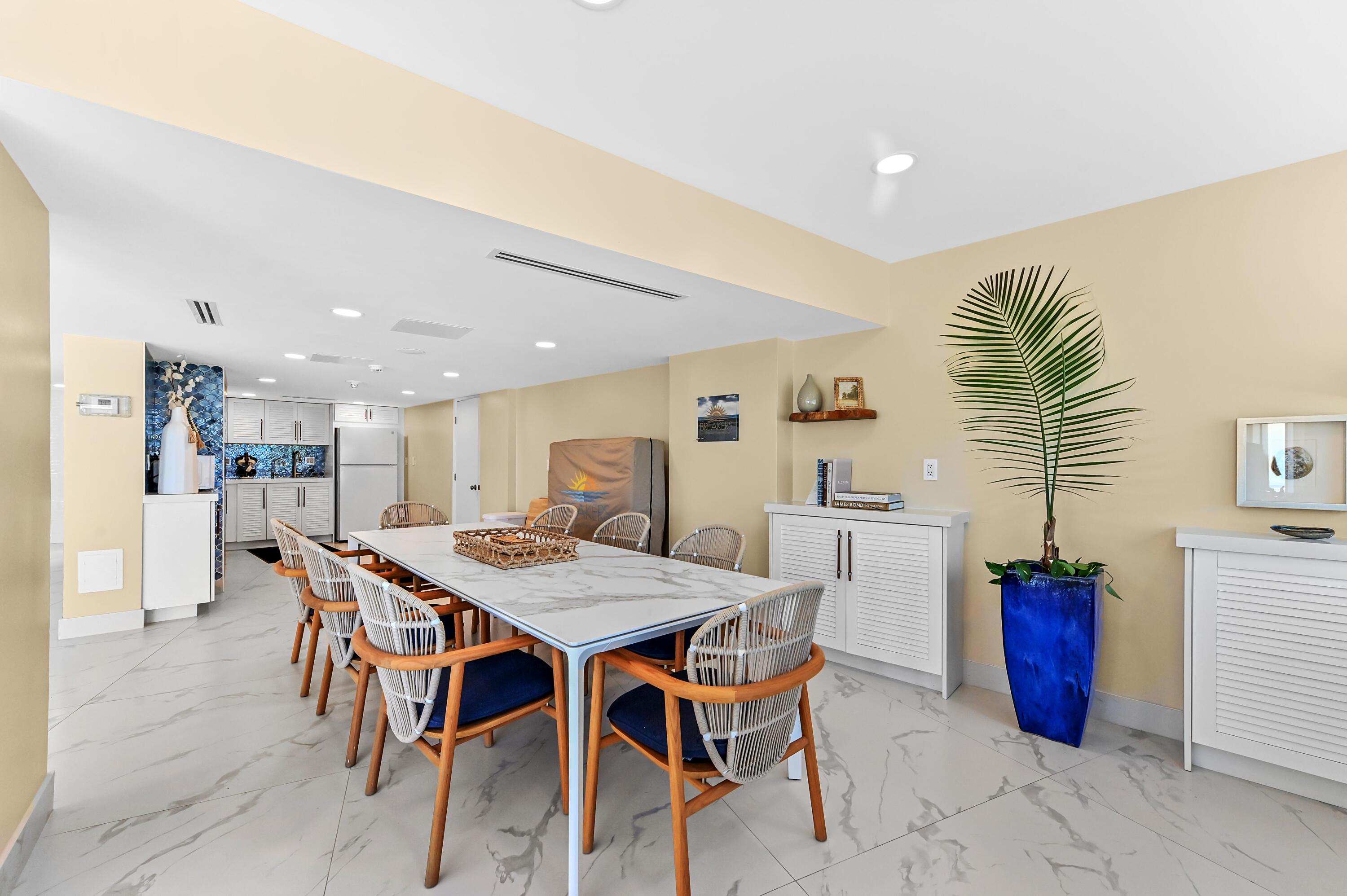 710 North Ocean Boulevard, Unit 710 Pompano Beach, FL 33062 - Photo 5 of 42 a view of a dining room with furniture