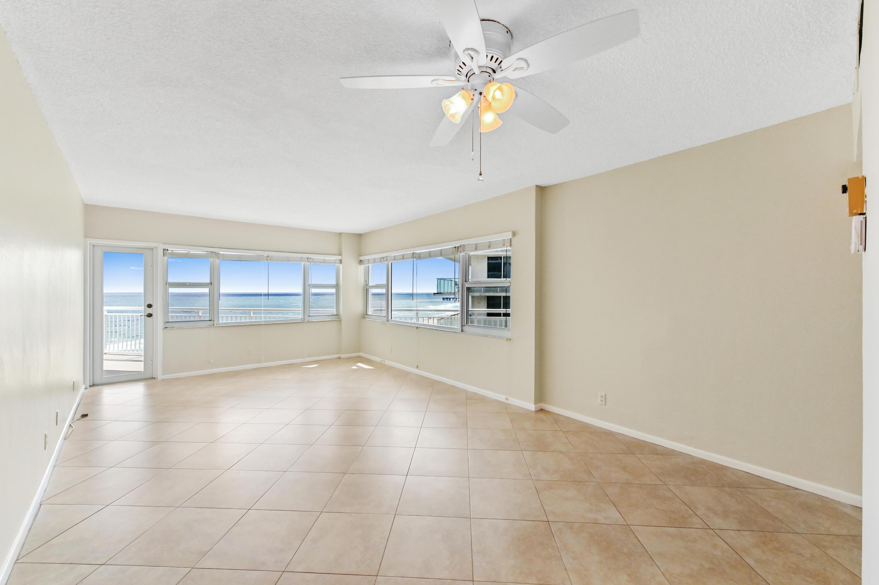 710 North Ocean Boulevard, Unit 710 Pompano Beach, FL 33062 - Photo 8 of 42 a view of an empty room with a window