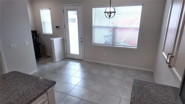a view of livingroom with furniture and window