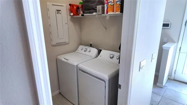 a utility room with dryer and washer