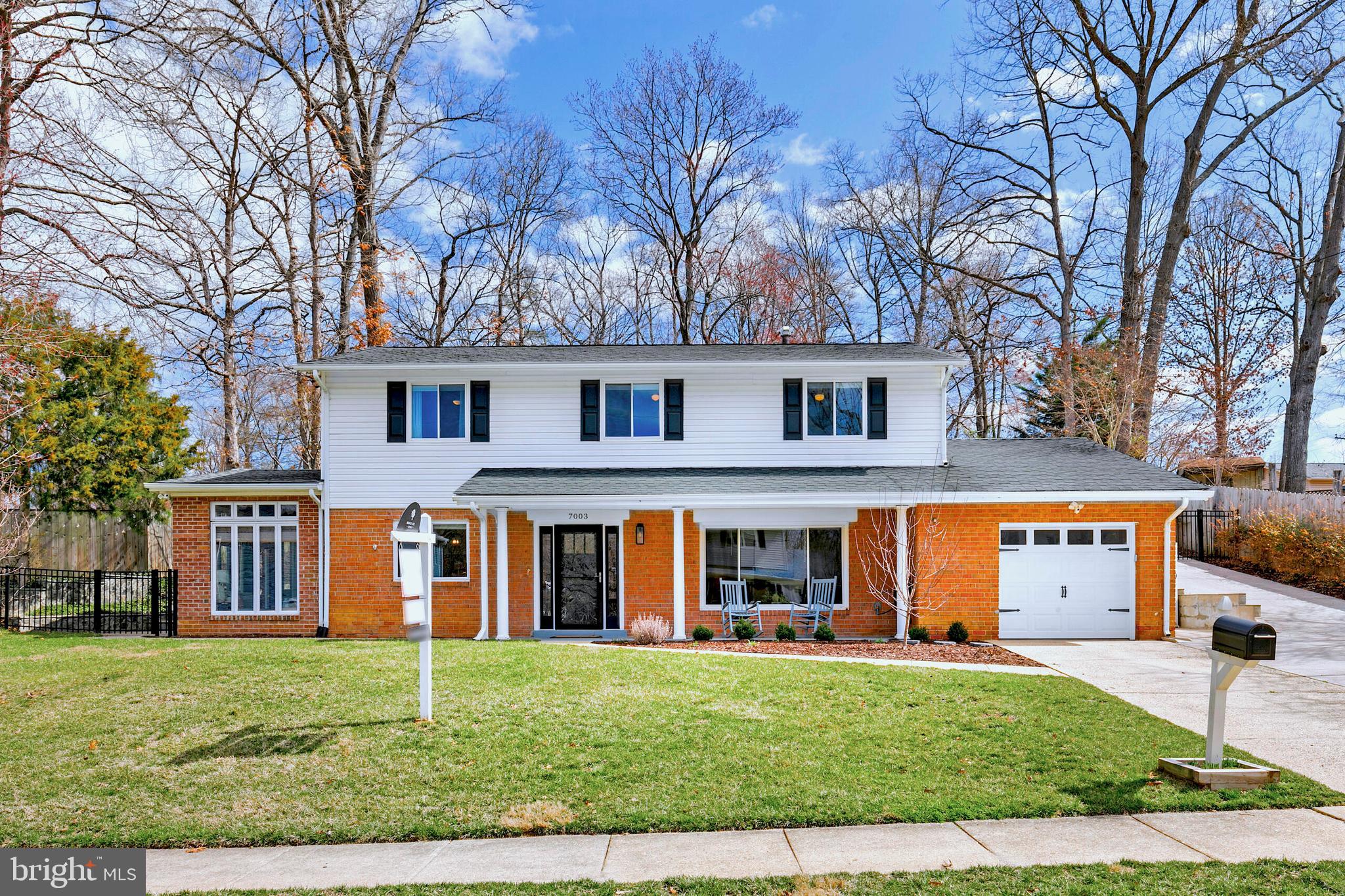7003 Vancouver Road Springfield, VA 22152 - Photo 1 of 38 front view of a house with a yard