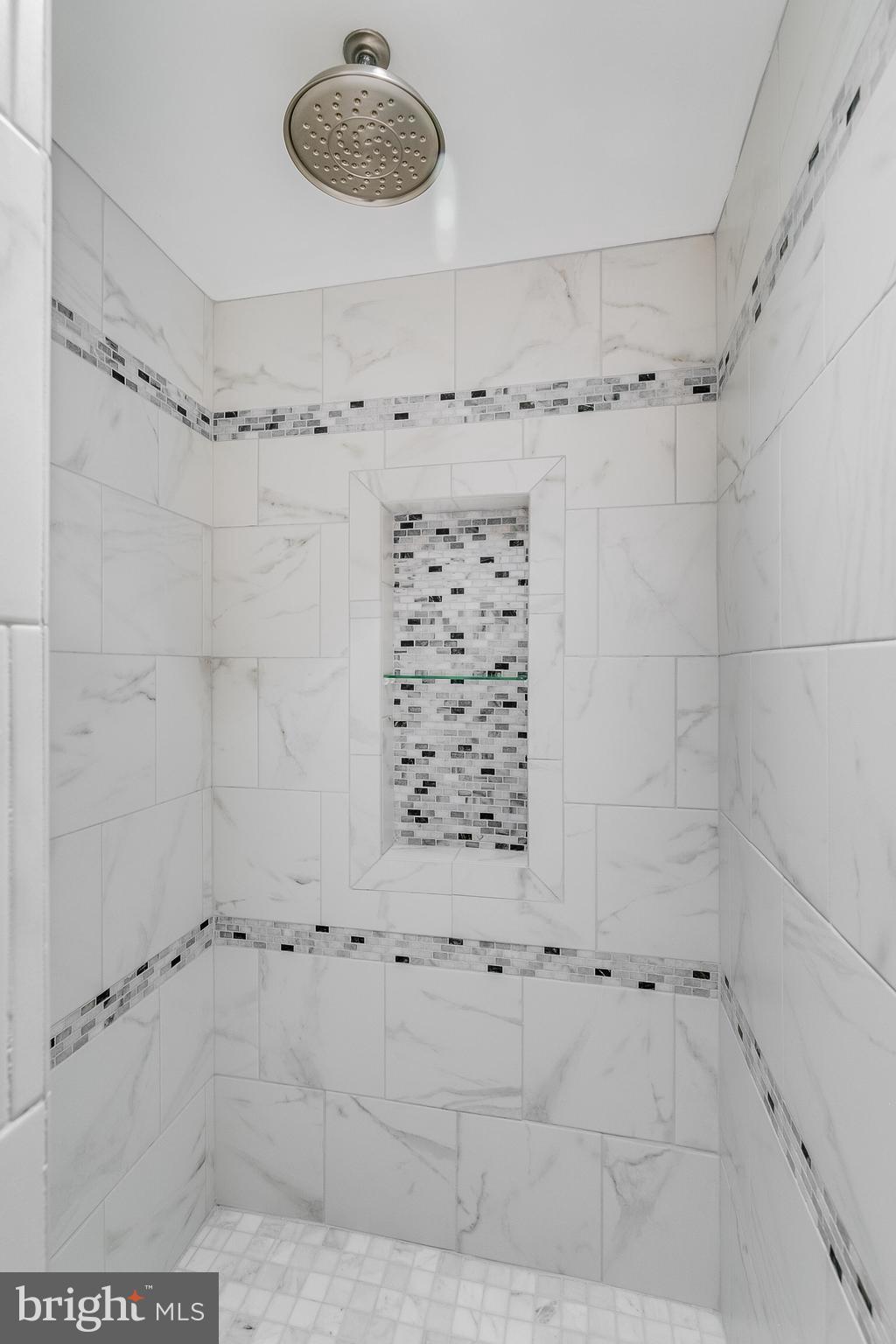 7003 Vancouver Road Springfield, VA 22152 - Photo 20 of 38 a bathroom with a shower