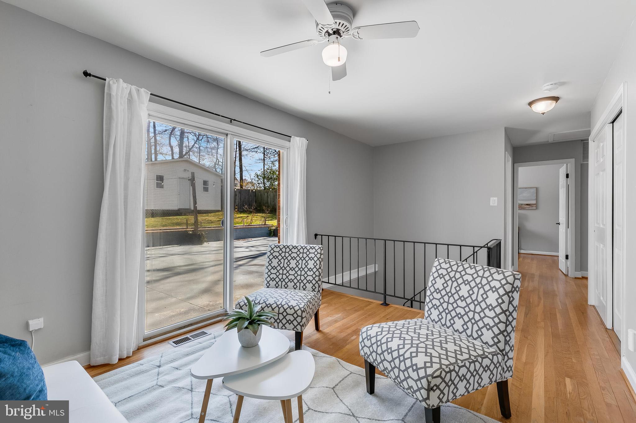 7003 Vancouver Road Springfield, VA 22152 - Photo 24 of 38 a living room with furniture and wooden floor