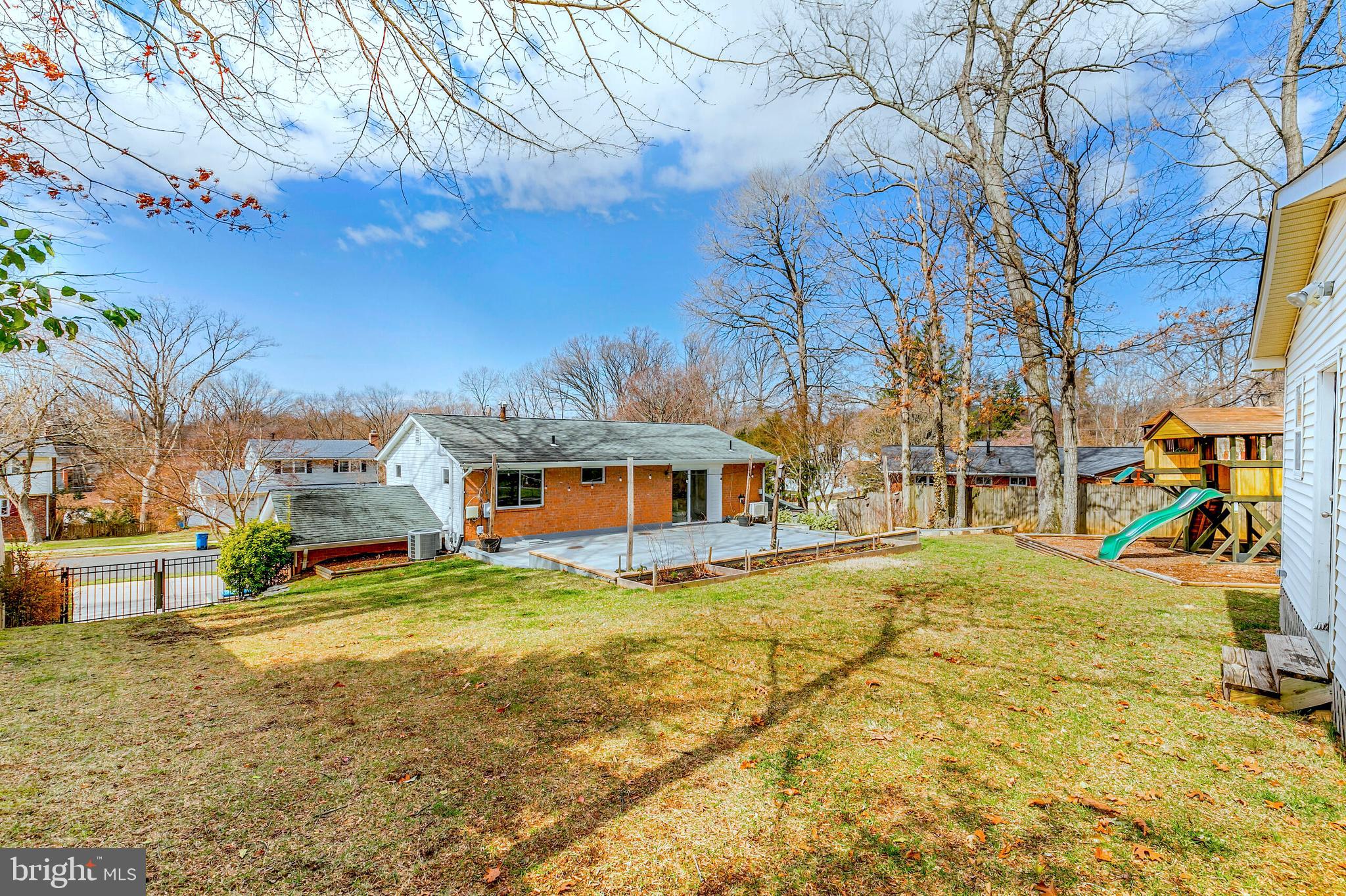 7003 Vancouver Road Springfield, VA 22152 - Photo 33 of 38 a view of a house with a snow in front of yard