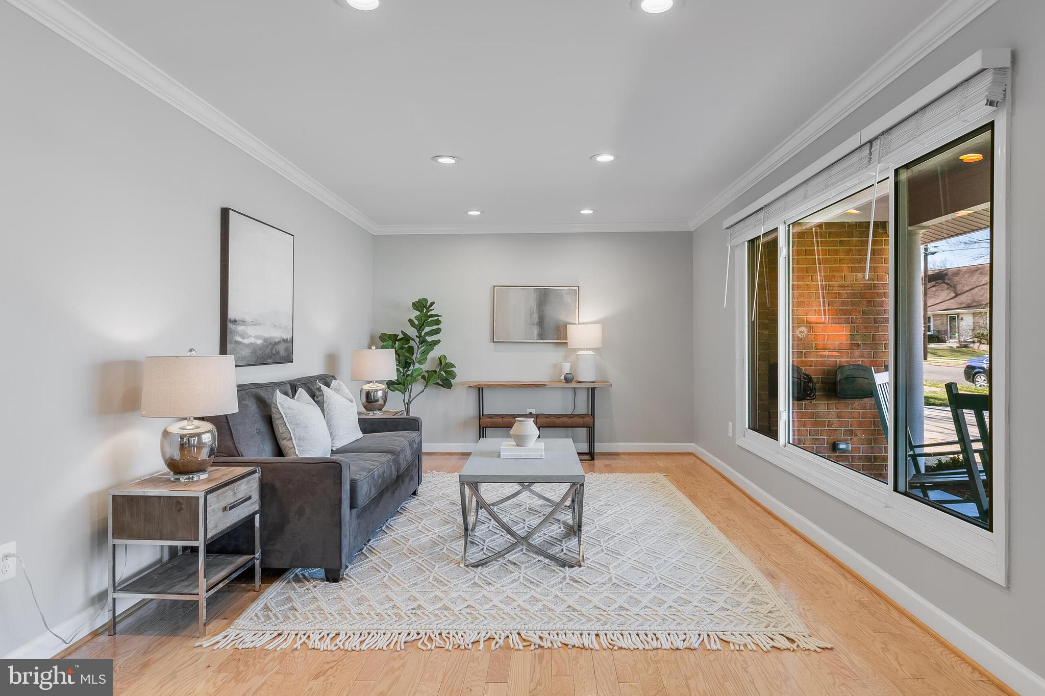 7003 Vancouver Road Springfield, VA 22152 - Photo 4 of 38 a living room with furniture and a large window