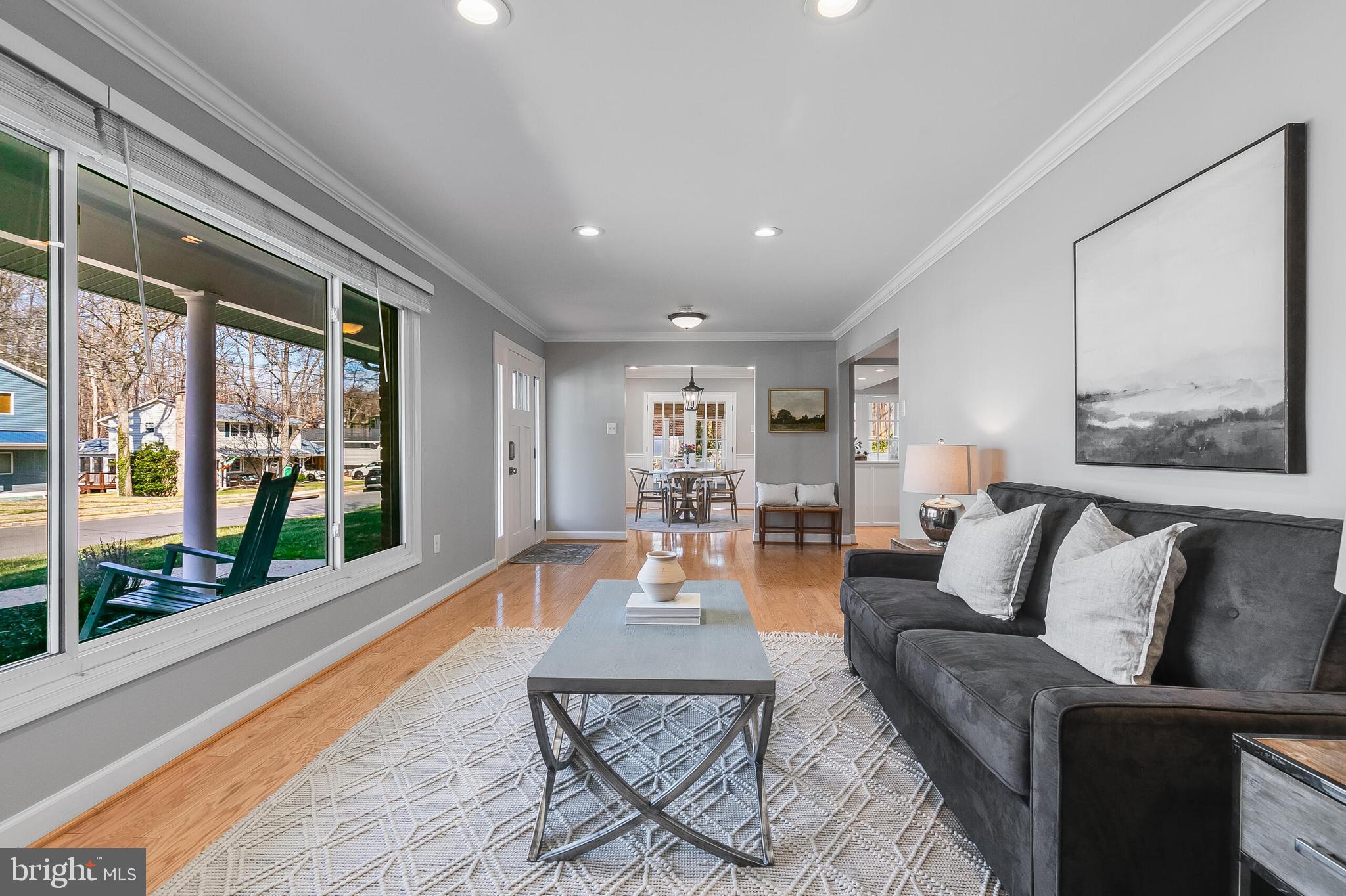 7003 Vancouver Road Springfield, VA 22152 - Photo 5 of 38 a living room with furniture and a large window