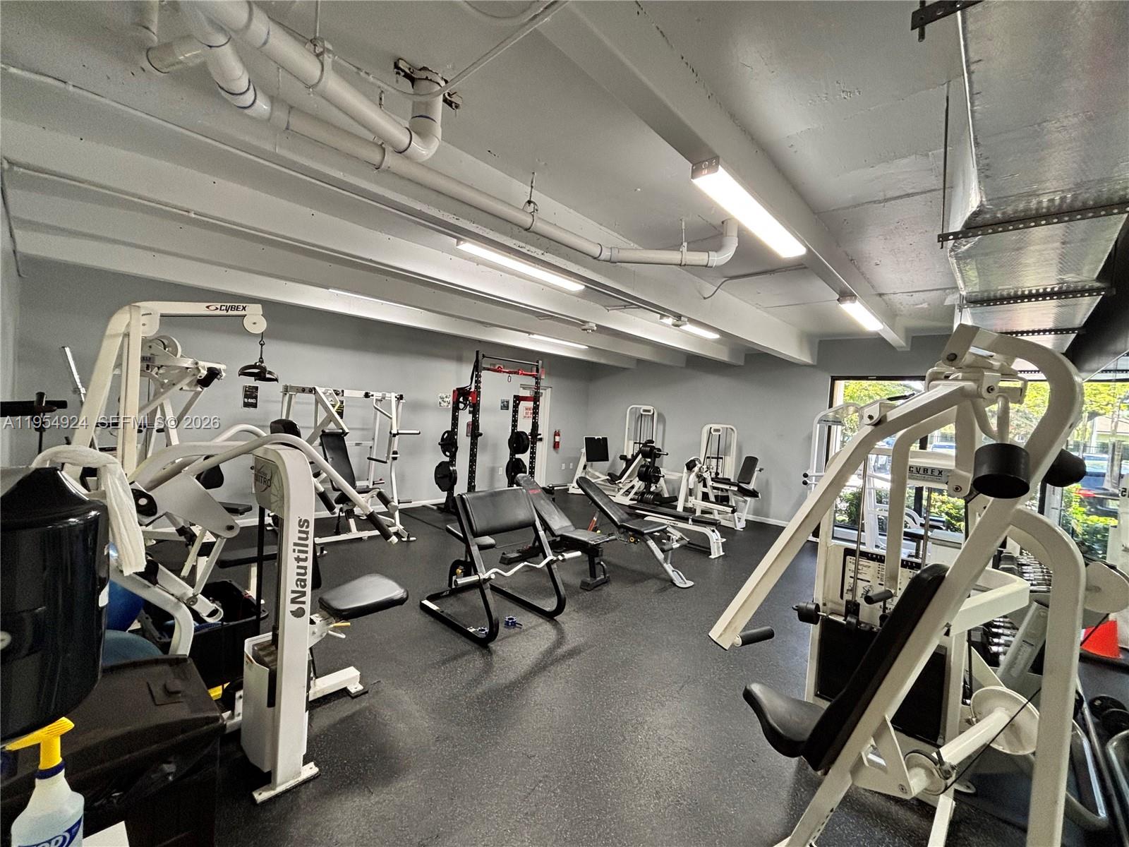 9301 Southwest 92nd Avenue, Unit A320 Miami, FL 33176 - Photo 15 of 20 a view of a room with gym equipment