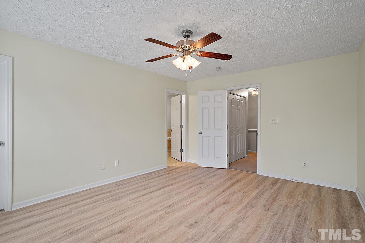 1909 Rathie Drive Durham, NC 27703 - Photo 22 of 32 a view of empty room with wooden floor