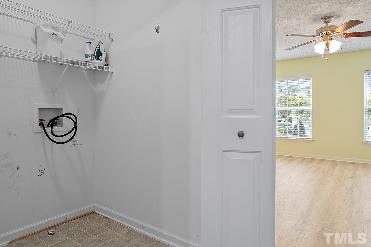 1909 Rathie Drive Durham, NC 27703 - Photo 25 of 32 a view of a storage & utility room with a window