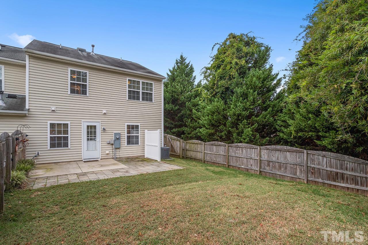 1909 Rathie Drive Durham, NC 27703 - Photo 30 of 32 a view of a house with a backyard