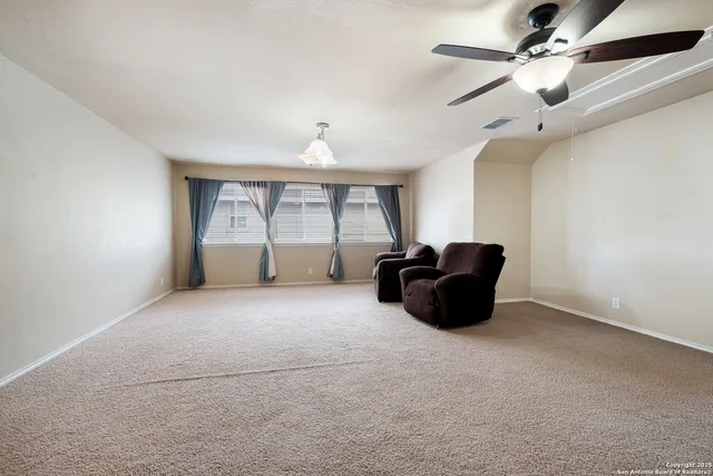 a big room with windows and closet
