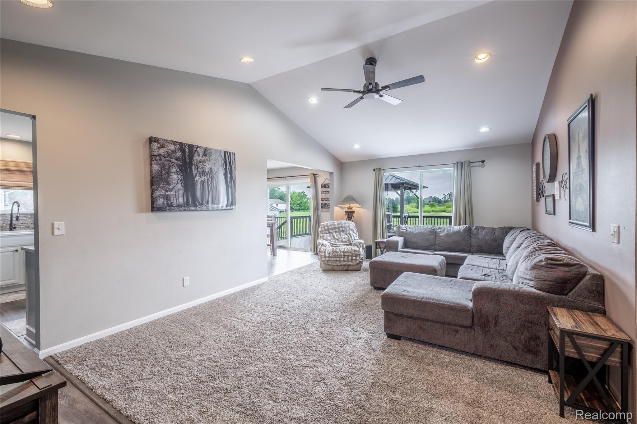 13063 Seymour Road Gaines, MI 48436 - Photo 8 of 29 Vaulted ceilings with recessed lighting, ceiling fan, and carpeted flooring