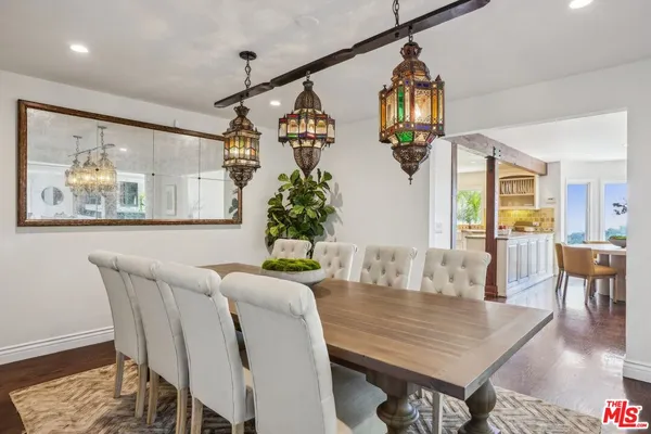 a kitchen with a stove sink and refrigerator