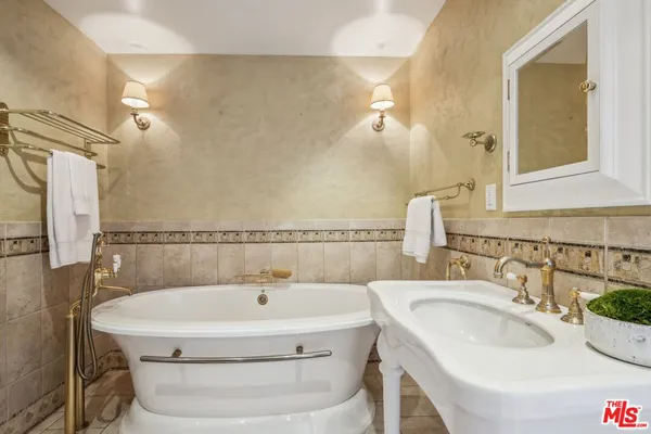 a picture of a bathroom with a sink