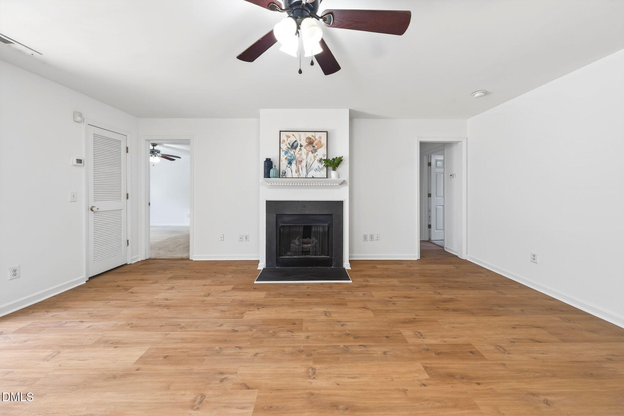 3612 Wellington Ridge Loop Cary, NC 27518 - Photo 13 of 35 a view of an empty room with window and fireplace