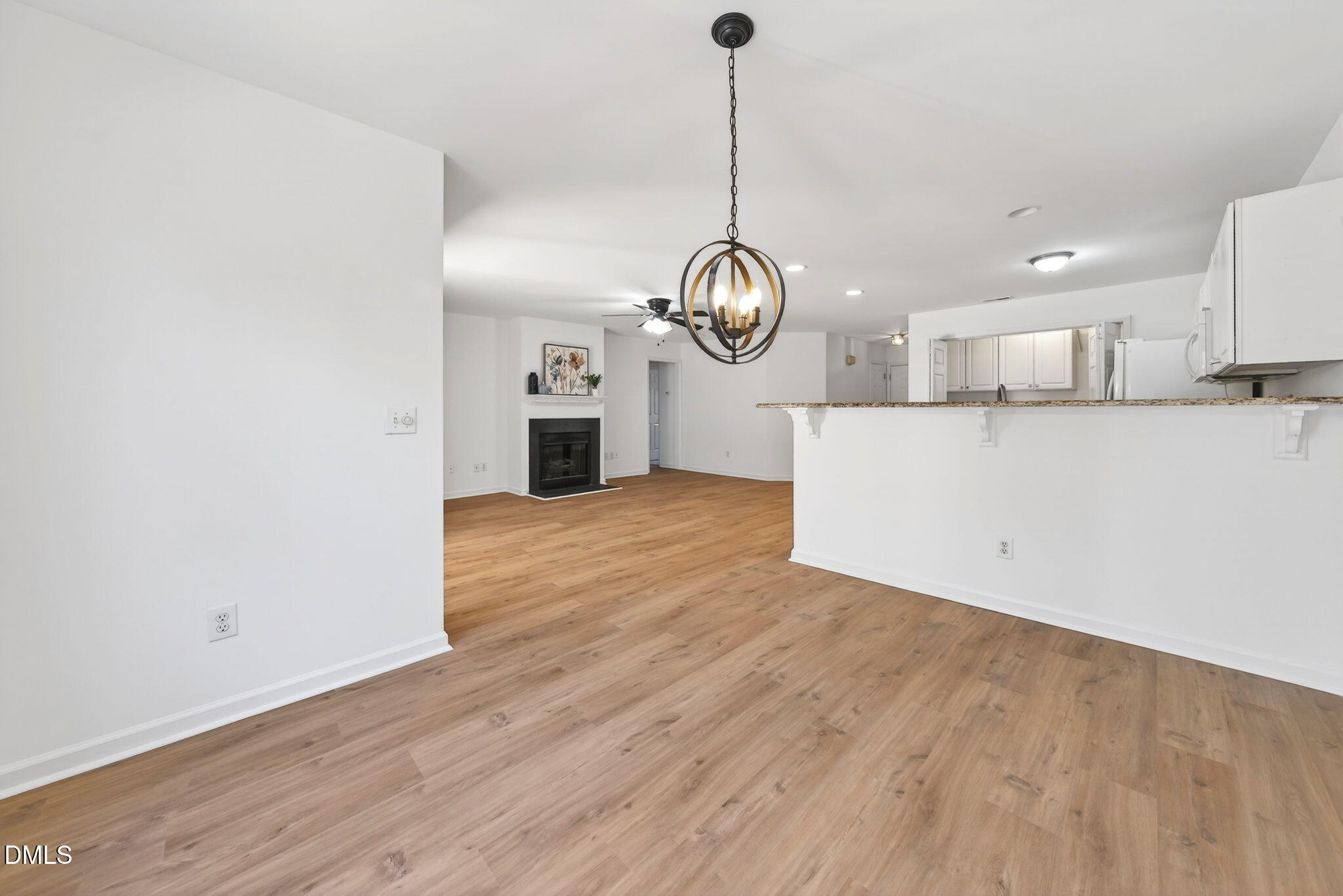 3612 Wellington Ridge Loop Cary, NC 27518 - Photo 17 of 35 a view of a room with wooden floor and view