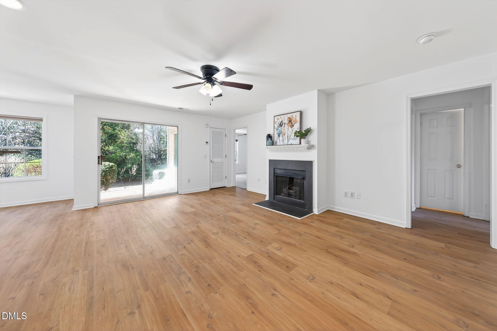 3612 Wellington Ridge Loop Cary, NC 27518 - Photo 10 of 35 a view of empty room with wooden floor and fan