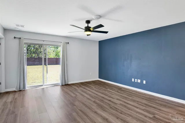 a view of a kitchen with a dishwasher and a refrigerator