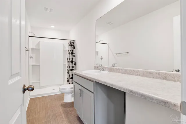 a view of an empty walk in closet