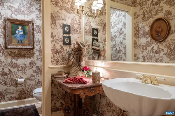 a bedroom with two beds and a fireplace