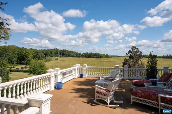 a view of yard with patio