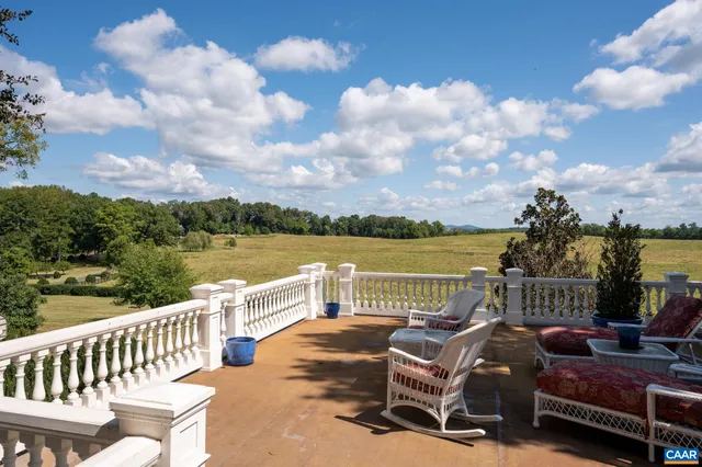 a view of yard with patio
