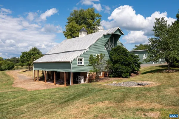 a view of a field with an ocean