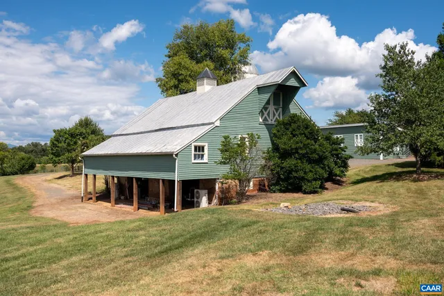 a view of a field with an ocean