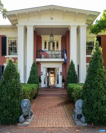 a living room with furniture and a gate