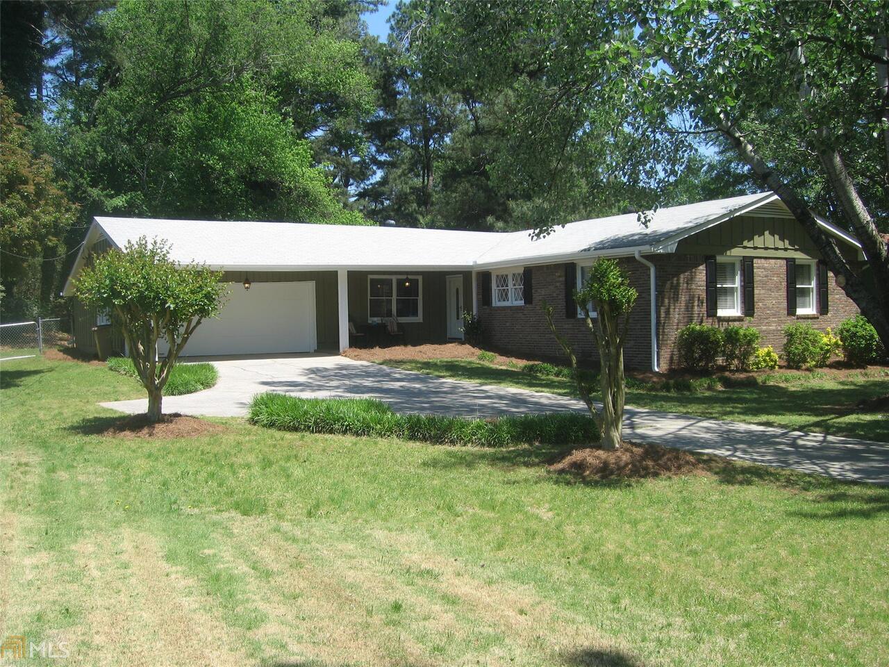 2109 Pinehurst Road, Unit 11 Snellville, GA 30078 - Photo 1 of 1 New paint, seamless gutters, and shutters.