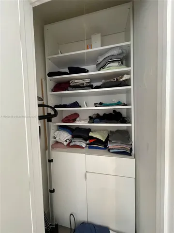 a storage room with washer and dryer