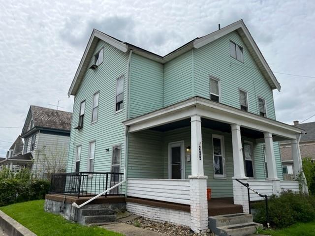 299 Reno Street Rochester, PA 15074 - Photo 12 of 12 a view of a house with a yard and wooden fence