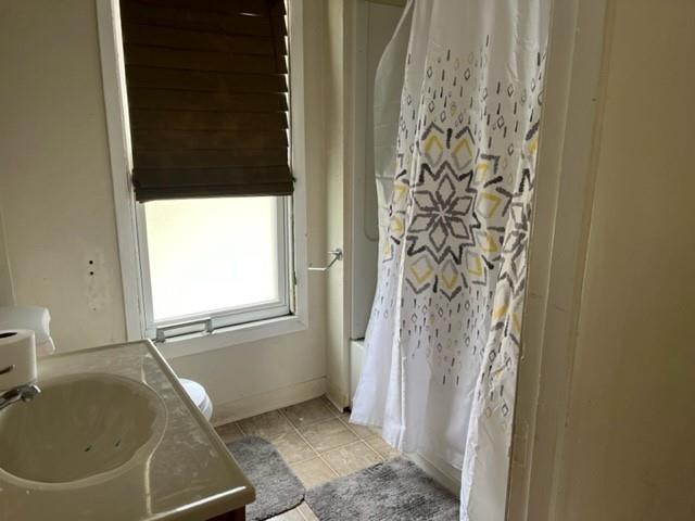 299 Reno Street Rochester, PA 15074 - Photo 6 of 12 a bathroom with a bathtub and shower