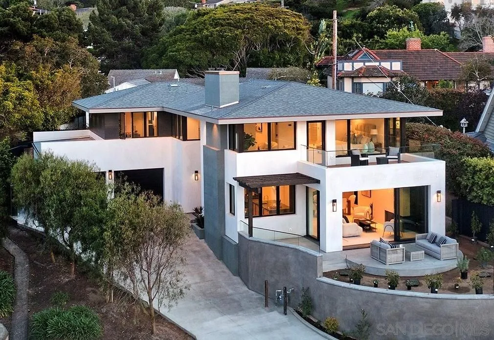 a front view of a house with entertaining space