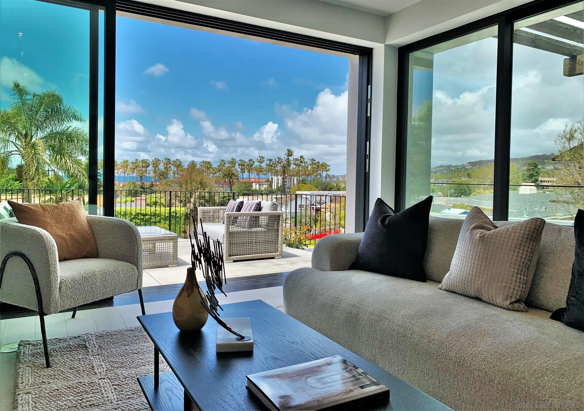 2045 Lowry Place La Jolla, CA 92037 - Photo 13 of 52 a living room with furniture and a floor to ceiling window