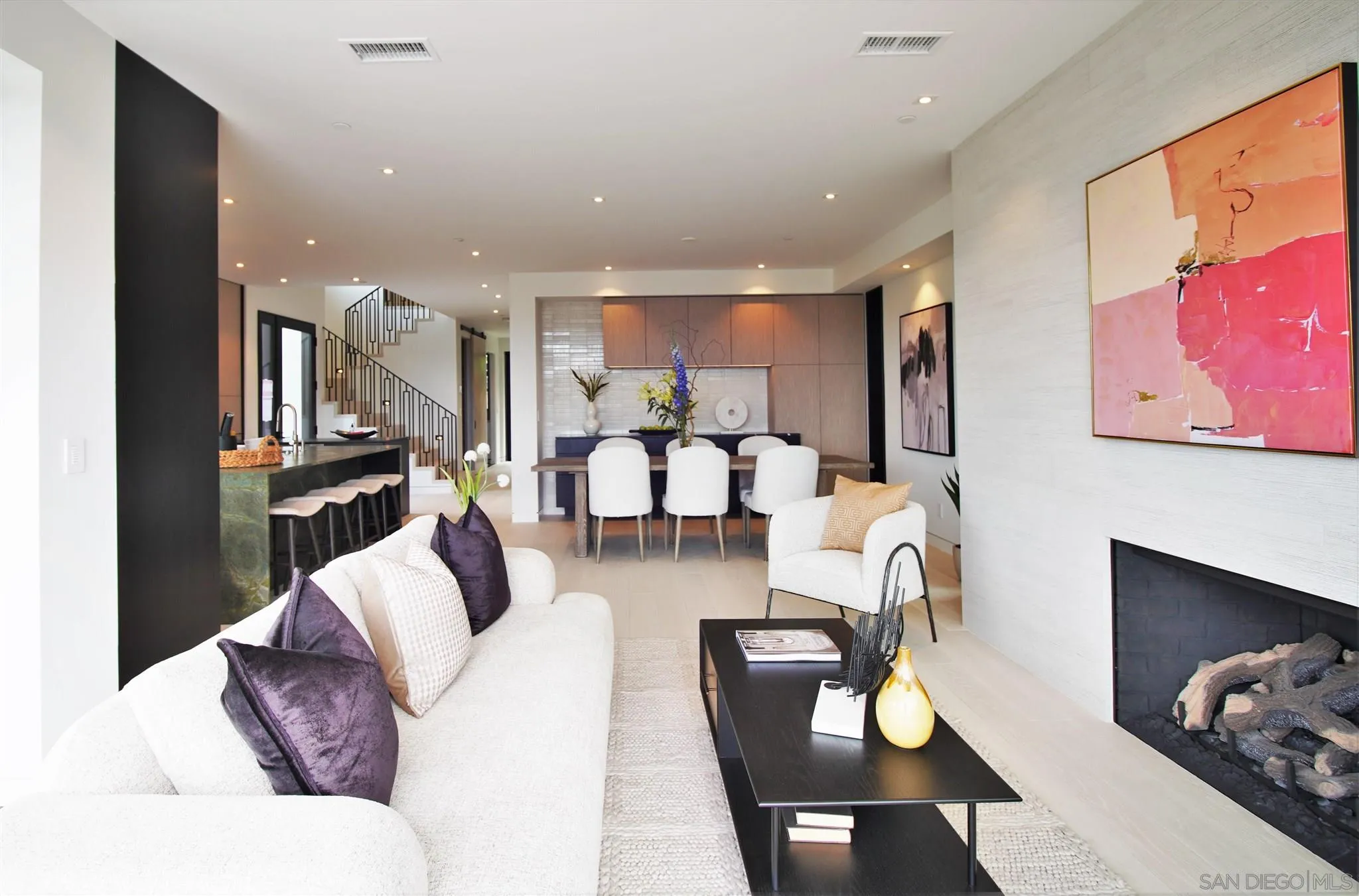 2045 Lowry Place La Jolla, CA 92037 - Photo 16 of 52 a living room with furniture and kitchen view