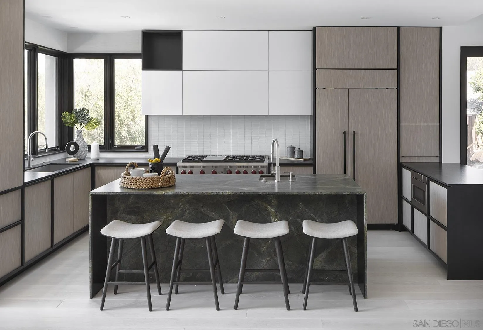 2045 Lowry Place La Jolla, CA 92037 - Photo 21 of 52 a kitchen with stainless steel appliances a sink and cabinets