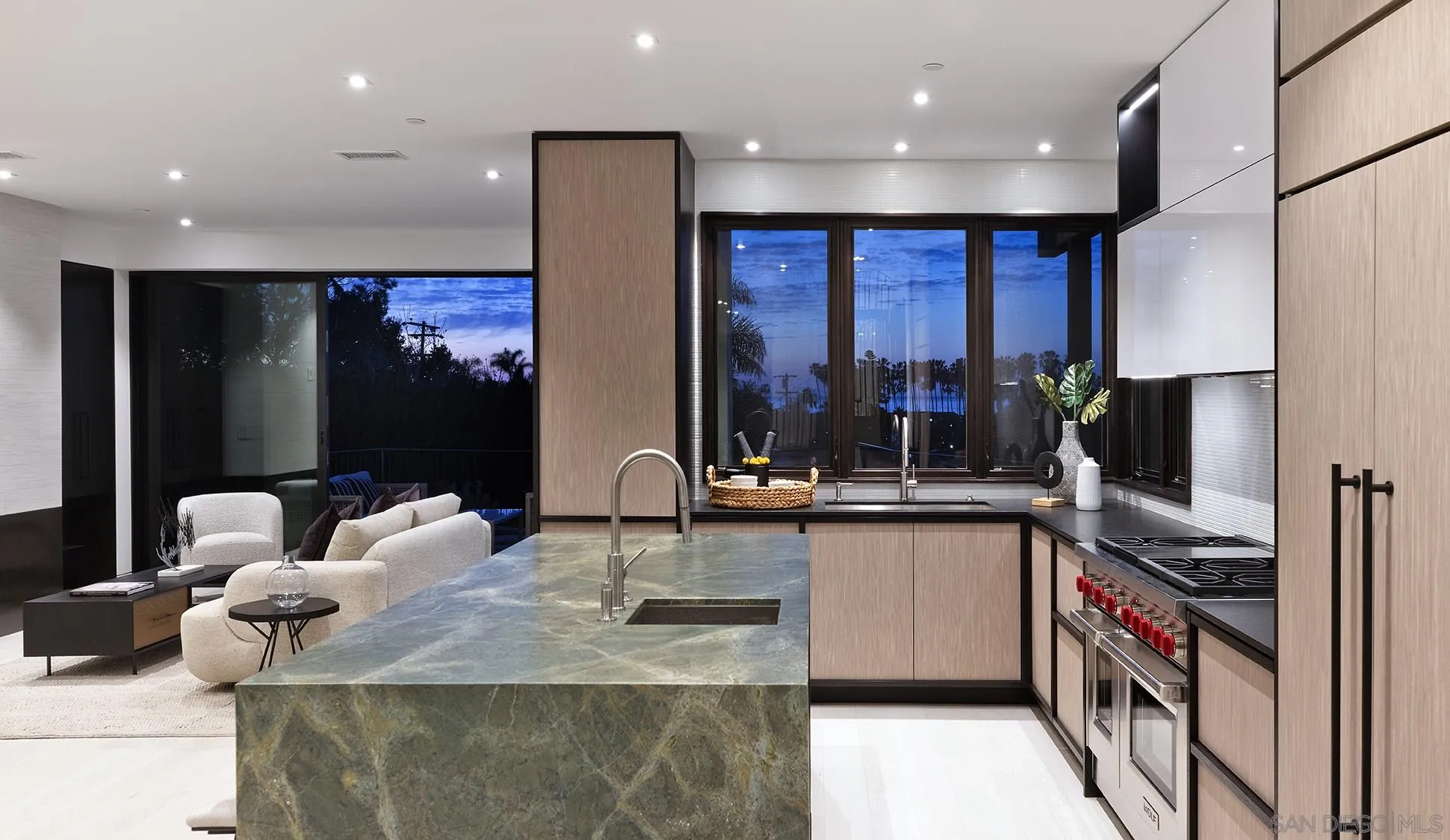 2045 Lowry Place La Jolla, CA 92037 - Photo 23 of 52 a kitchen with kitchen island granite countertop a sink and a stove