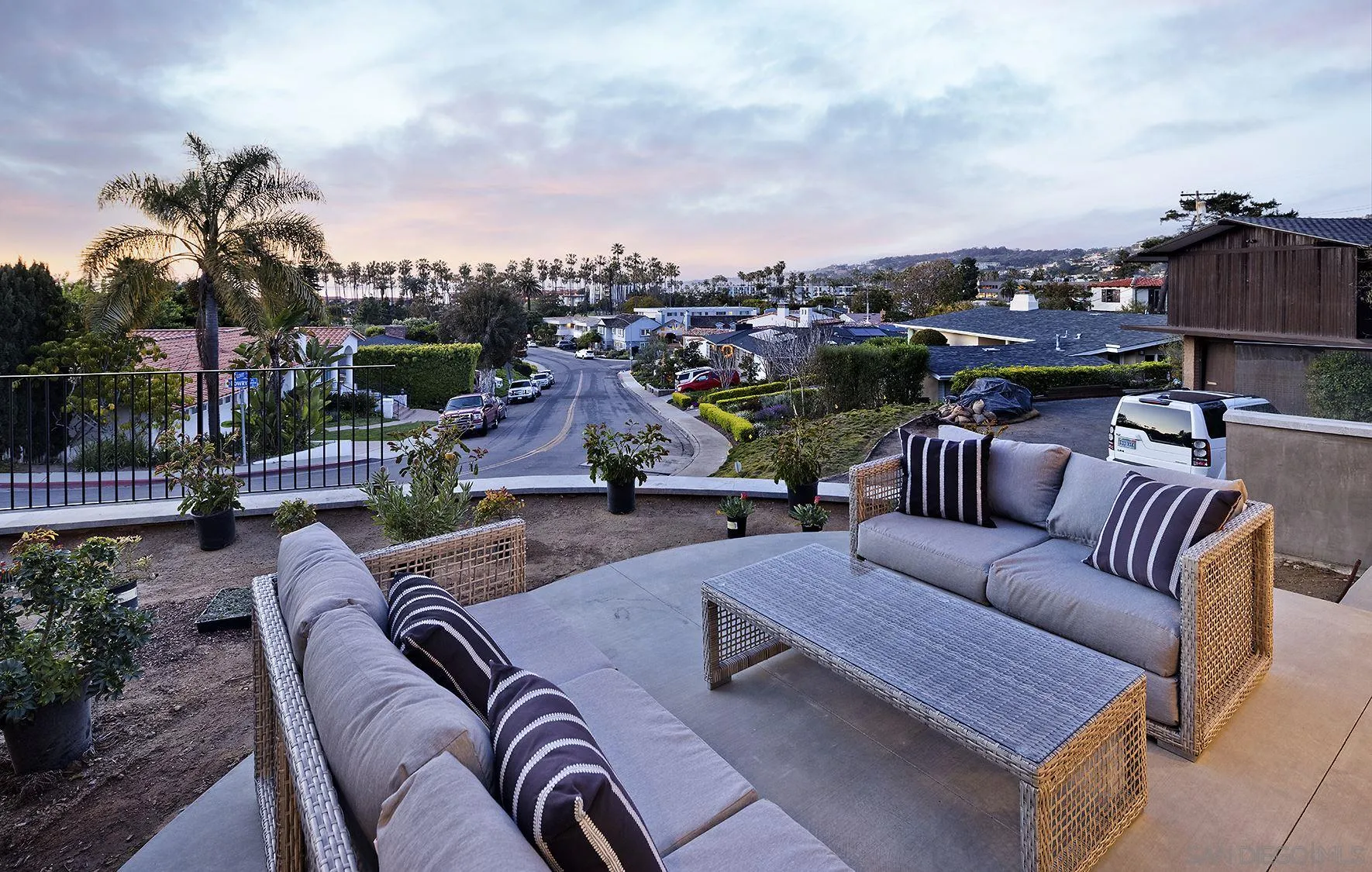2045 Lowry Place La Jolla, CA 92037 - Photo 27 of 52 a view of a rooftop deck patio with couches chairs and potted plants