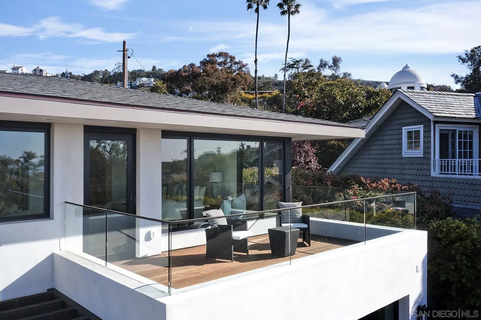 2045 Lowry Place La Jolla, CA 92037 - Photo 5 of 52 a view of a terrace with couches and wooden floor