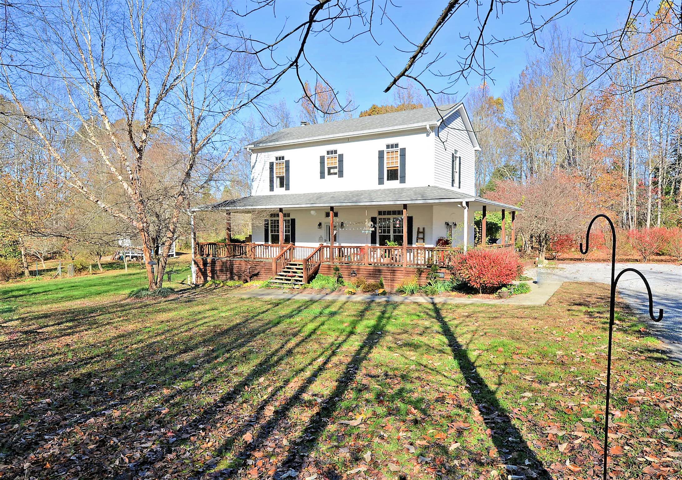 745 Balthrop Road Chapmansboro, TN 37035 - Photo 1 of 14 Peaceful modern country farmhouse on a private lot with 25 acres!