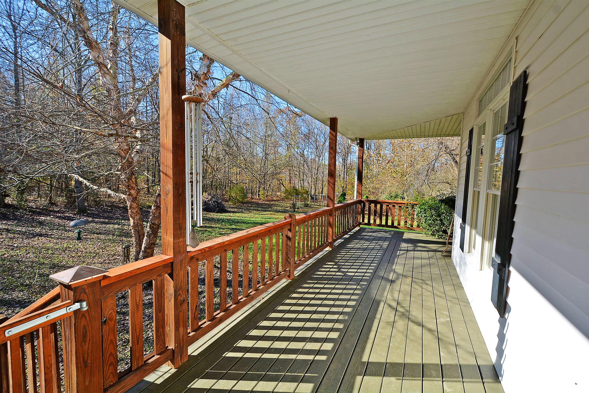 745 Balthrop Road Chapmansboro, TN 37035 - Photo 2 of 14 Amazing wrap around porch!