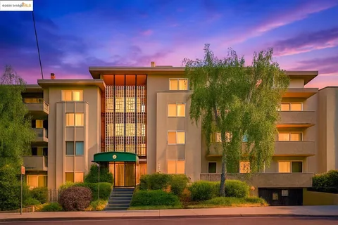 a front view of a multi story residential apartment building