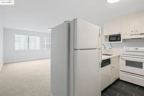 a view of washer and dryer with sink