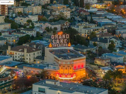 an aerial view of a houses with yard