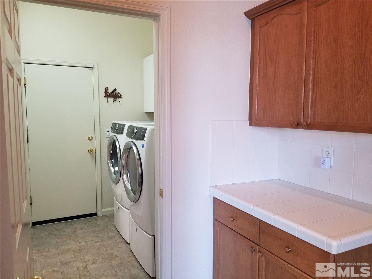 9625 Glen Ridge Drive Reno, NV 89521 - Photo 12 of 23 a utility room with dryer and washer