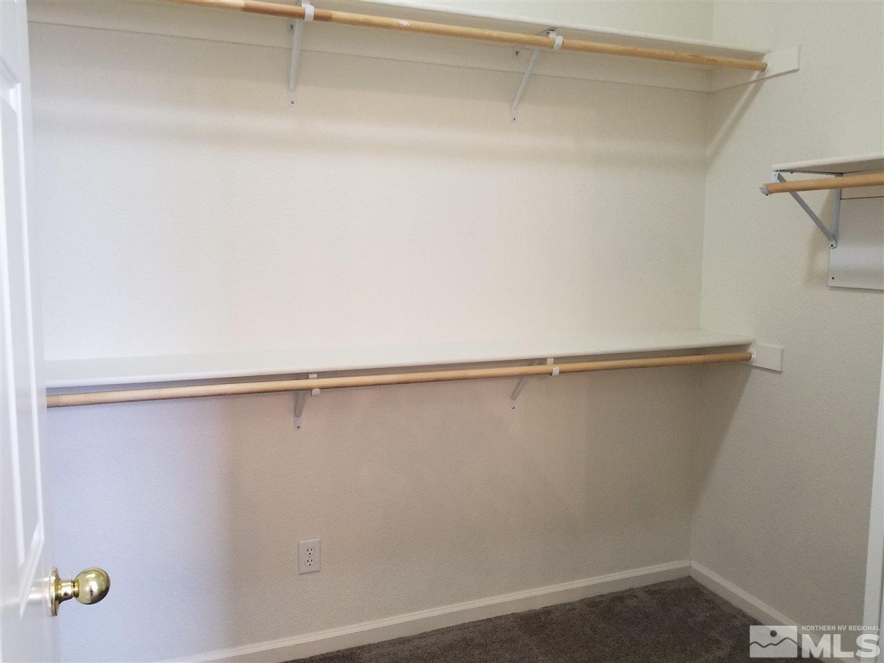 9625 Glen Ridge Drive Reno, NV 89521 - Photo 17 of 23 a view of a room with shelf on the wall